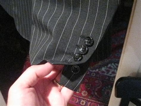 what are fake suit button holes called